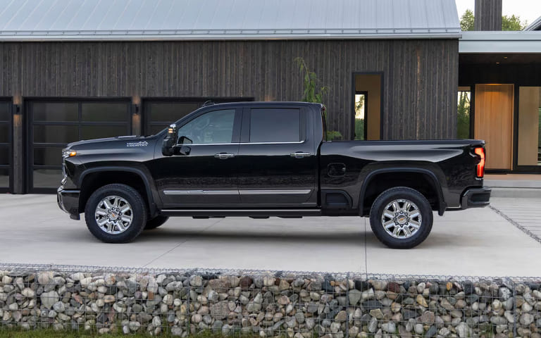 Driver stepping out of a Chevrolet SUV before selling or trading a vehicle