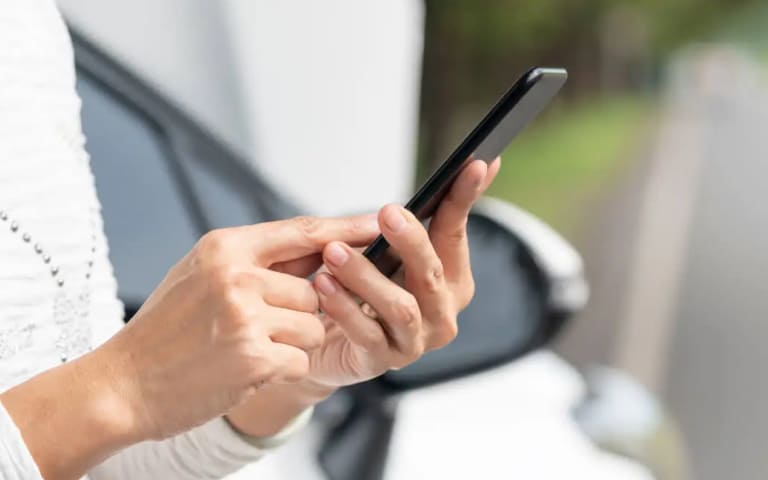 Customer using an online Mitsubishi valuation tool for a fast trade-in estimate